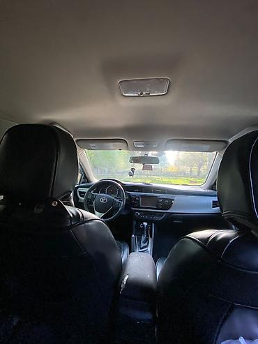 4 göz maşını: Toyota Corolla: 1.8 l | 2014 il Sedan — 6