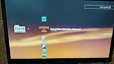 diz ustu notbuk: PlayStation 3 Super Slim oyun konsolu. Termo pasta deyişilib — 2