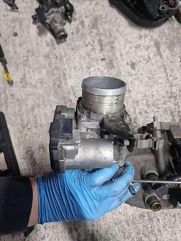 sipka za stvari: KLAPNA GASA 1.6 TURBO METAN ZA OPEL ZAFIRA | Svi delovi za Opel — 1