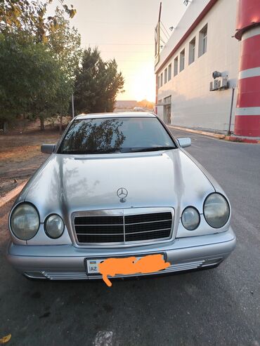 mersedes qapı: Mercedes-Benz E 230: 2.3 l | 1995 il Sedan
