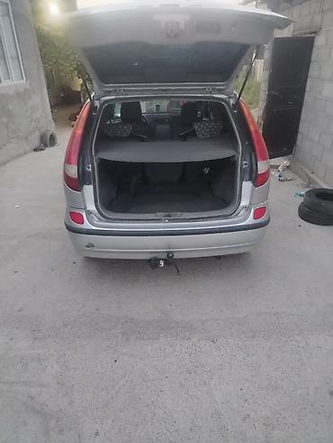 Nissan Almera Tino: 2002 г., 1.8 л, Механика, Бензин, Хэтчбэк at lalafo.kg — 4 Nissan Almera Tino: 2002 г., 1.8 л, Механика, Бензин, Хэтчбэк — 4