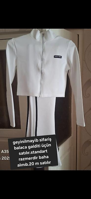 son model donlar: - Bənövşəyi rəngdə, V yaxalı, ön hissəsi və ətək kənarı iri daşlarla — 4