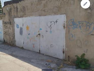 darvaza qapi rengleri: Qaraj satılır .40 kv. Karl Marks ilə Ayna Sultanova heykəlinin — 1
