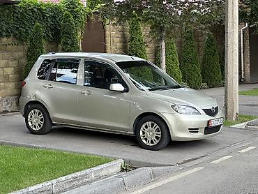 сг: Mazda Demio: 2003 г., 1.3 л, Автомат, Бензин, Хэтчбэк — 2