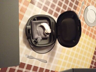 Slušni aparati: Nov Slusni aparat oticon — 8