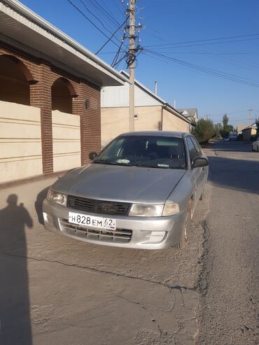 грузовой автомобиль: Mitsubishi Lancer: 1997 г., 1.3 л, Механика, Бензин, Седан
