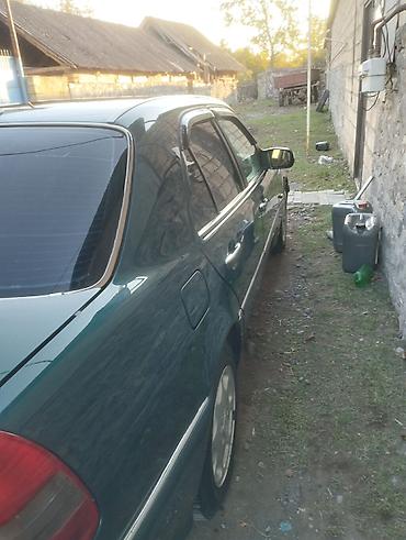 volkswagen passat nece masindi: Mercedes-Benz E-Class (W210) sedan - Kuzov: 4 qapılı sedan, tünd — 1