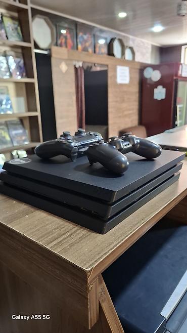 PS4 (Sony Playstation 4): Sony PlayStation 4 oyun konsolu 2 pultla prosifkalı model — 4