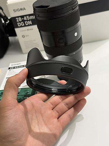 Фото и видеокамеры: Продаю Sigma 28-45mm f1.8 Sony E mount, полный кадр Покупал 7го — 8