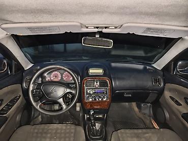 2001: Mitsubishi Carisma: 2001 г., Седан — 6