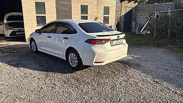накитка на авто: Toyota Corolla: 2021 г., 1.8 л, Вариатор, Гибрид, Седан — 10