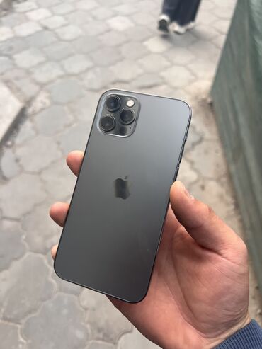 купить кнопочный сотовый телефон: IPhone 12 Pro, Б/у, 128 ГБ, Графит, Чехол, 80 %