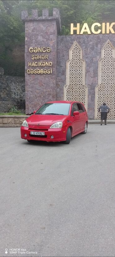 авто шлем: Suzuki Aerio: 2 л | 2002 г. 255888 км Универсал