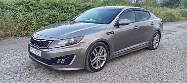optima otracaqlar: Kia Optima sedan – SX paketi Mühərrik və ötürmə: - Benzinli mühərrik — 2