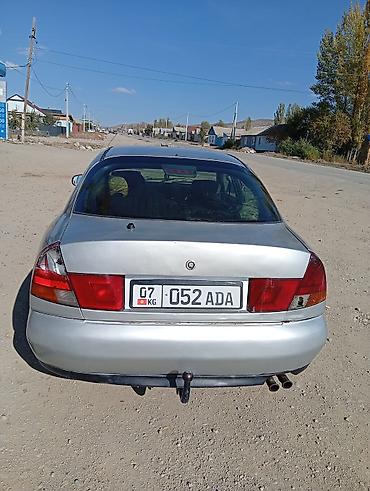 б4 80: Mitsubishi Carisma: 1998 г., 1.8 л, Механика, Бензин, Седан — 4