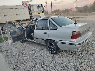 kiya: Daewoo Nexia: 1994 г., 1.5 л, Механика, Бензин, Седан — 4