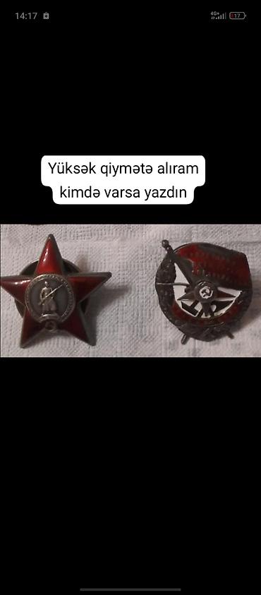 qedim rus pullari aliram: Sovet dövrünə aid köhnə orden və nişanlar axtarılır. Şəkildə — 1