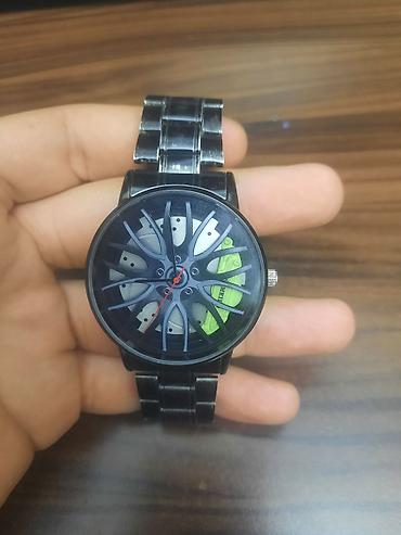 m16 plus smart watch: Avtomobil təkəri dizaynlı qol saatı Bezi yerlerinde cuzi rengi gedib — 1