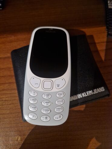 Nokia 3310 ideal vəziyətdədi adaptor yoxudu amma usta üzü görməyib