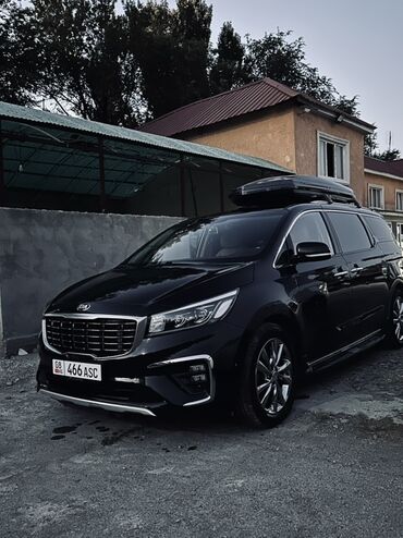 бетономешалка цена в бишкеке: Черный минивэн Kia Carnival с кузовом, выполненным в классическом