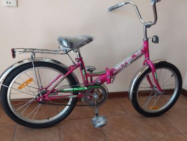 магазин велосипедов stels бишкек: Продаю новый складной велосипед для девочки 10-13лет.STELS ( Россия)