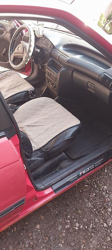 ош пакрышки: Opel Astra: 1993 г., Кол менен иштөөчү, Хетчбек — 2