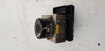 adapter za penomat: ABS MOTOR PUMPA ZA NISSAN NAVARA, PATHFINDER OD 2005. DO 2012. GOD — 1