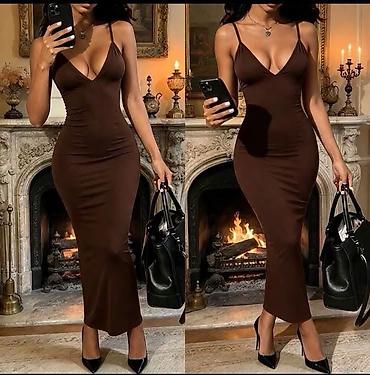 Haljine: Elegantna ženska midi haljina na tregere
2400 din
S M L — 2