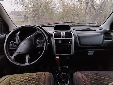 Mitsubishi: Mitsubishi Space Star: 2001 г., Универсал — 7