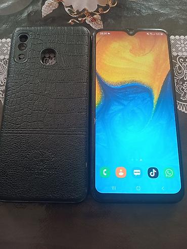 Мобильные телефоны и аксессуары: Samsung Galaxy A20, 32 ГБ, цвет - Черный, Отпечаток пальца — 2