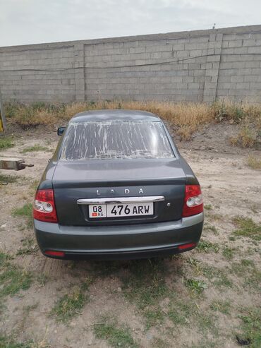 дом на обмен: LADA Priora седан, темно‑серый цвет кузова. Основные особенности: -