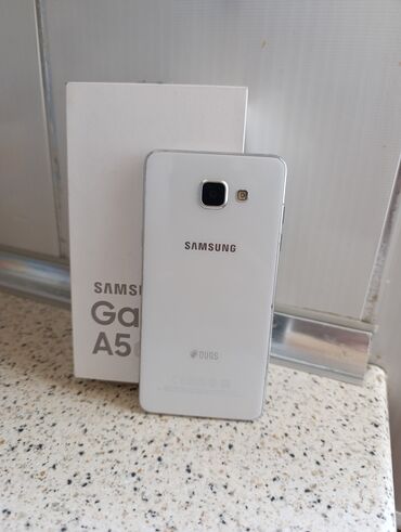 samsung a5 2018 qiymeti: Samsung Galaxy A5, < 2 ГБ, цвет - Белый, Кнопочный, Сенсорный, Отпечаток пальца
