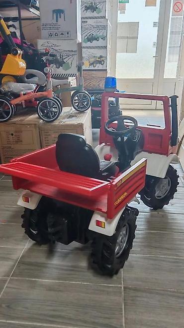 brod igracka za decu: Dečje vozilo na pedale – Mercedes-Benz Unimog vatrogasno vozilo (Rolly — 5