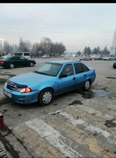 гидрокомпенсатор нексия: Автомобиль Daewoo Nexia бирюзового цвета, представленный в кузове