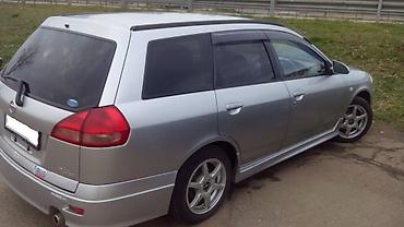 универсал 210: Запчасти на Nissan Wingroad (универсал), серебристый — 2