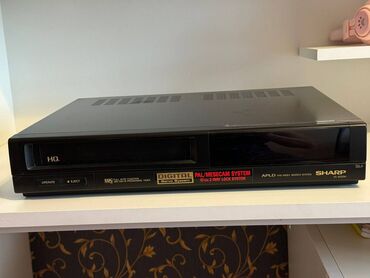 dvd player kontakt home: Sharp brendinə aid video maqnitofon işlək vəziyətdədir