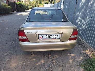 mini coper: Mazda 323: 2000 г., 1.5 л, Автомат, Бензин, Седан — 5