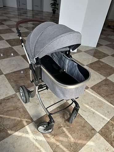 Uşaq arabası LuxMom markası. Əla vəziyyətdədir. Sumkası, tülü