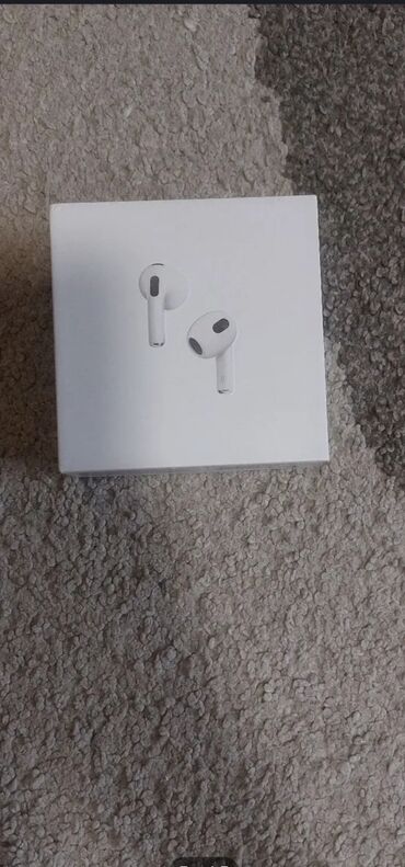 punjac za iphone 12 pro max: Bežične slušalice Apple AirPods (3. generacija) sa kućištem za