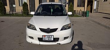 кредит на машину: Mazda Demio: 2004 г. — 4