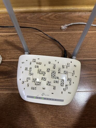 Modemlər və şəbəkə avadanlıqları: TP-Link simsiz marşrutlaşdırıcı, evdə və ya kiçik ofisdə internet