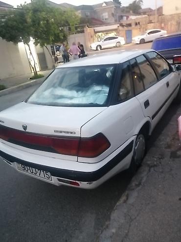 daewoo espero 2000: Daewoo Espero sedan – ağ rəng, 4 qapı, ön təkər dartımlı. Geniş salon — 3