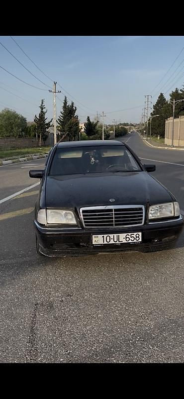 mercedes şəkilləri: Mercedes-Benz C‑Class (W202) sedan – qara rəng. Xüsusiyyətlər: - — 9