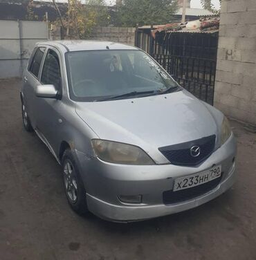 купить чехлы на гольф 4: Mazda Demio: 2003 г., 1.4 л, Механика, Бензин, Хэтчбэк