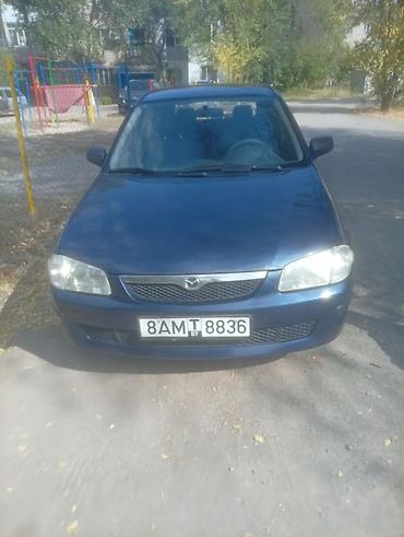 аудио касета: Mazda 323: 2000 г., Механика, Бензин — 1