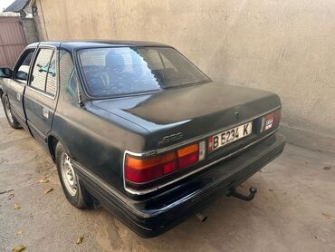 клык на вольво: Mazda 929: 1987 г., Седан