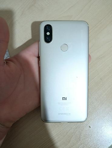 redmi not 6: Xiaomi Mi 2A, 64 GB, rəng - Qızılı, 
 Düyməli, Barmaq izi, İki sim kartlı — 1