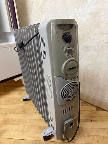 Обогреватели и камины: Ünvan : Həzi aslanov Gənclər parkı Nikai yağ radiatoru – elektrikli — 2