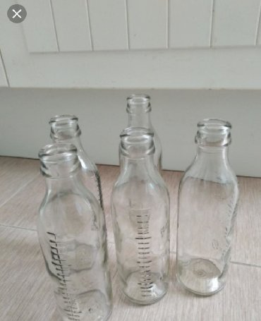 бутылка детская: Продается мерная стеклянная бутылка 200 мл в количестве более 1200шт