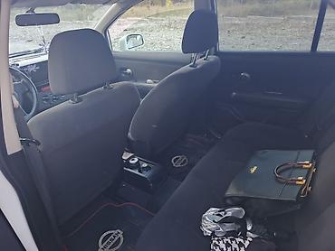 mini cooper qiymeti 2020: Nissan Tiida: 1.4 l | 2012 il Sedan — 4
